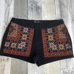 MAISON Scotch/Scotch & Soda black shorts with multicolored tapestry like design.